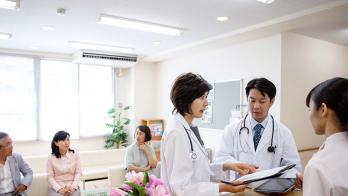 A physicians office with Asian and NHPI physicians and patients.